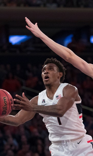 Connecticut upsets No. 15 Syracuse behind Adams and Gilbert